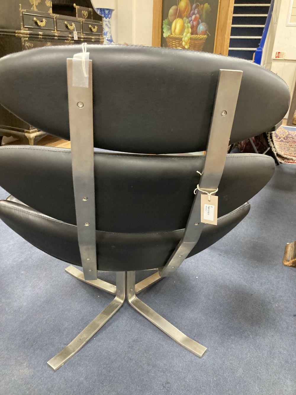 An EJ5 Corona style Lounge Chair and matching footstool,